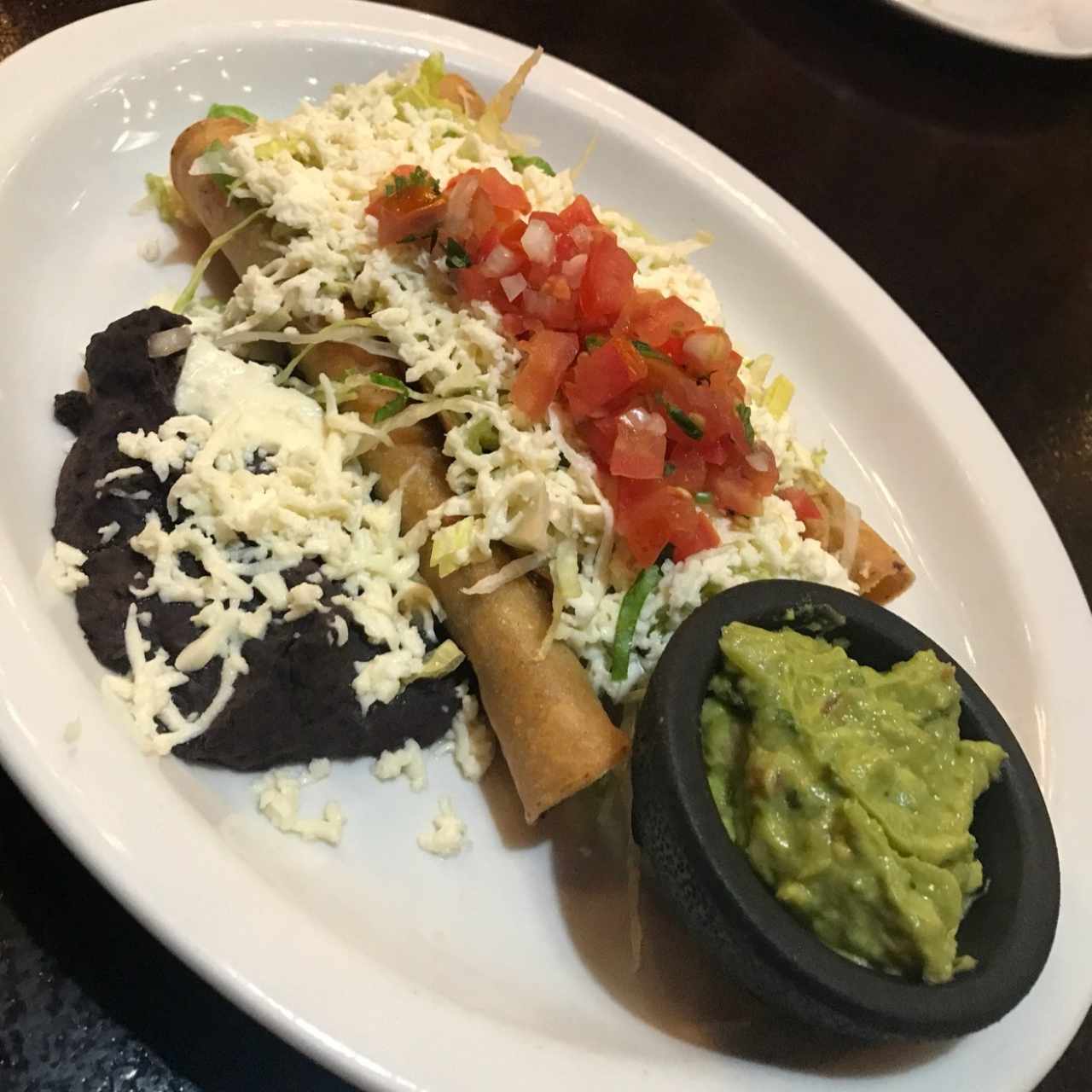 Flautas de carne de res y pollo