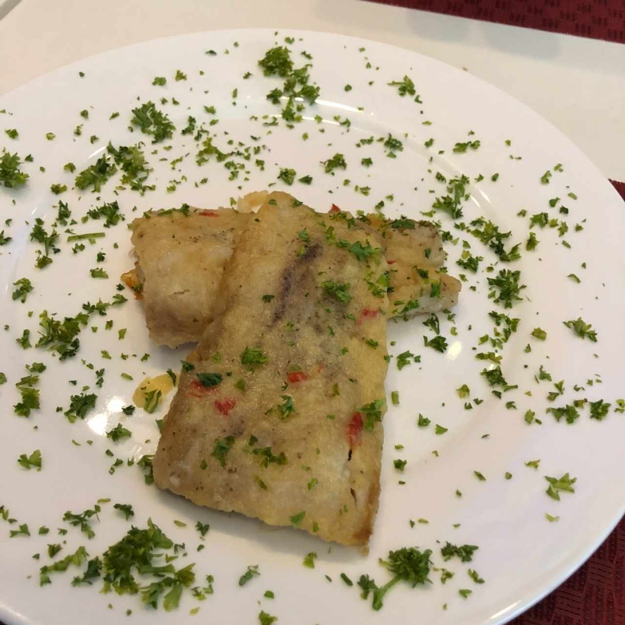 Filete corvina al ajillo