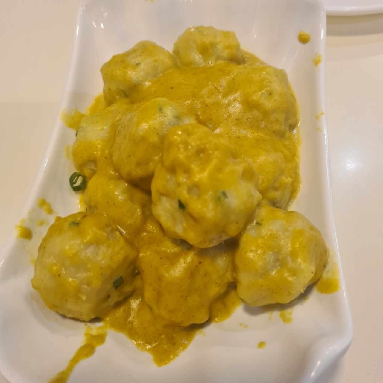 bolitas de pescado al curry