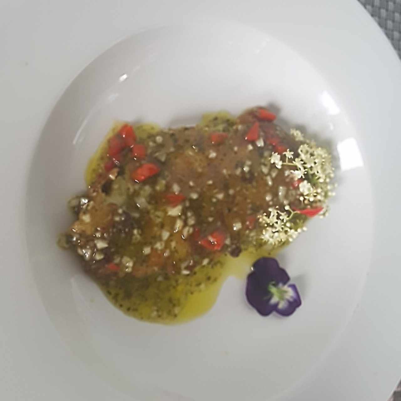 Filete de Corvina al ajillo. 