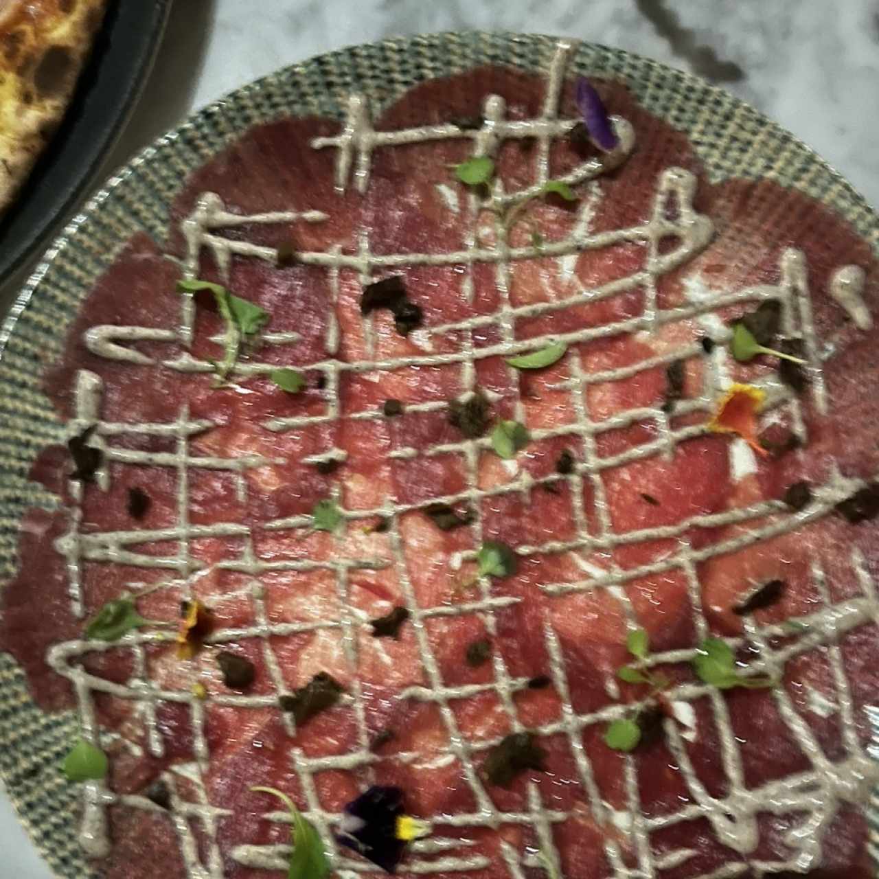 Antipasti - Carpaccio al Tartufo