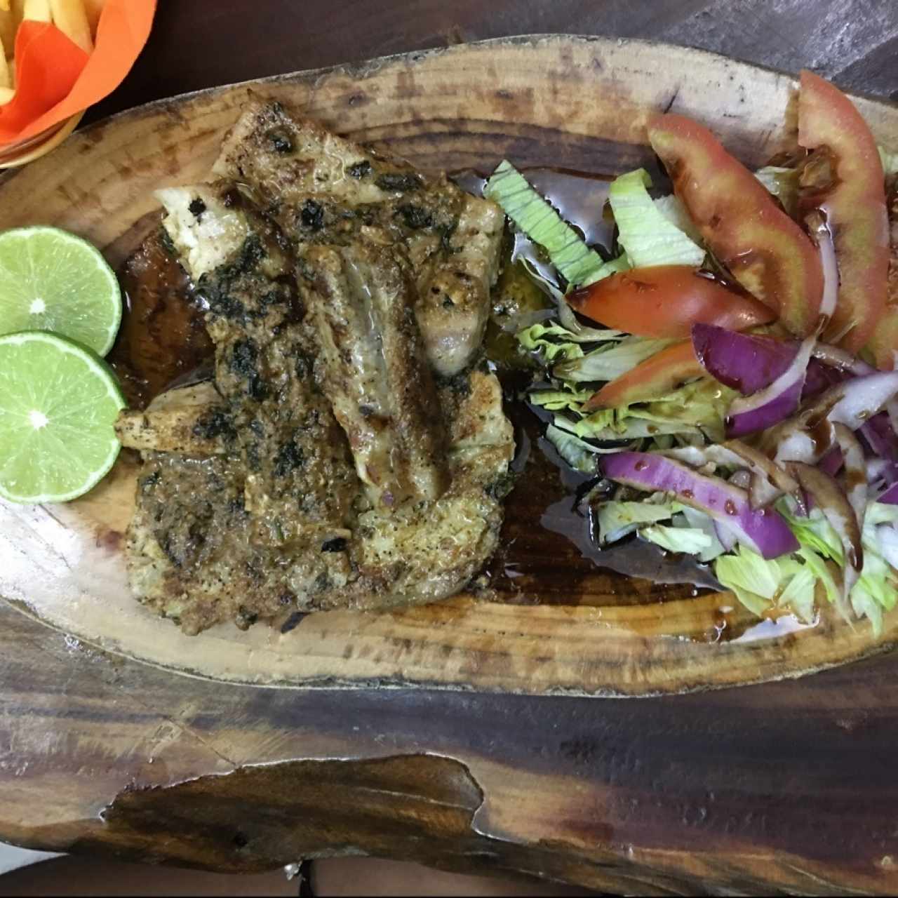 Filete de pescado Al ajillo