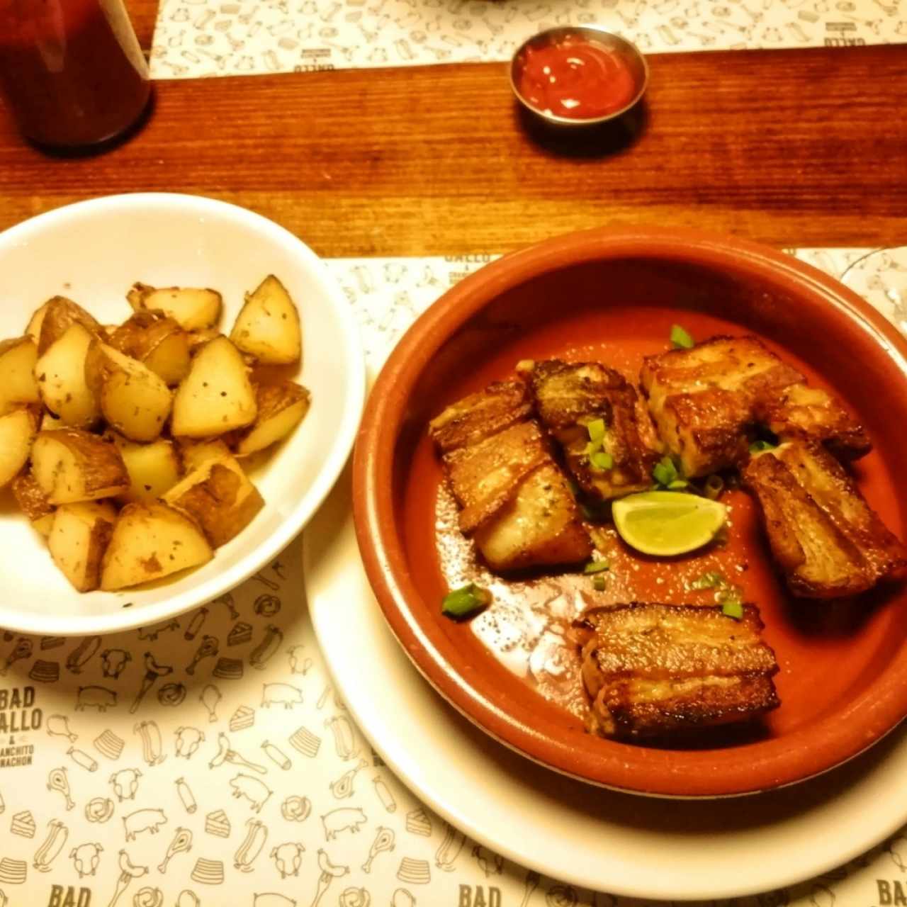 Porción de Costillar con Papas Salteadas