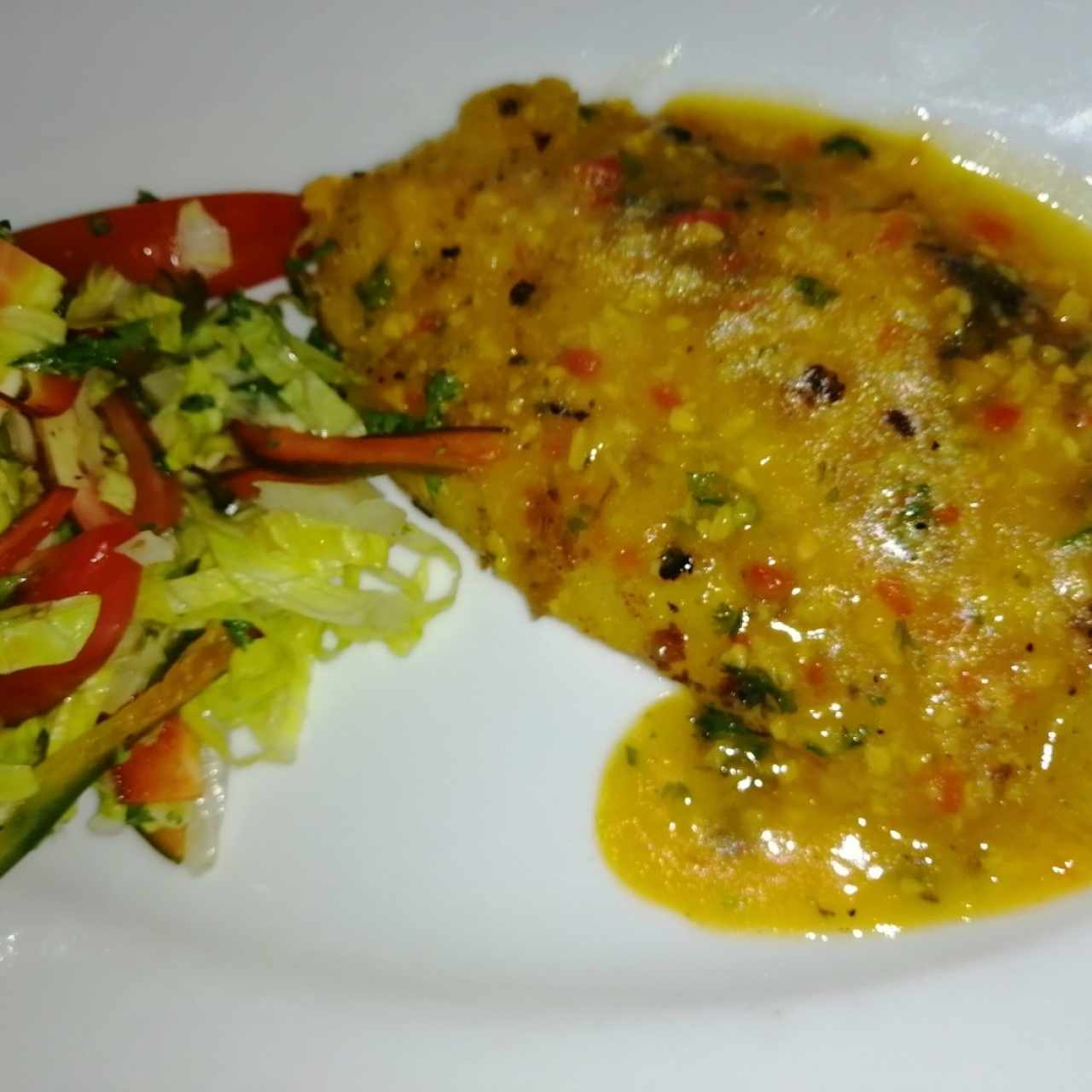 Filete de corvina al ajillo 