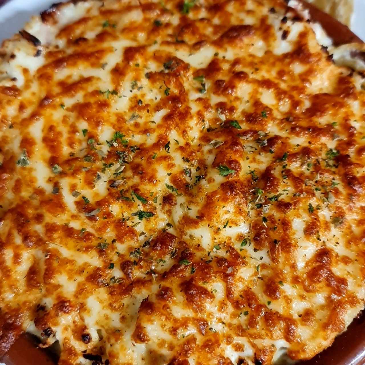 Pasta con queso fundido