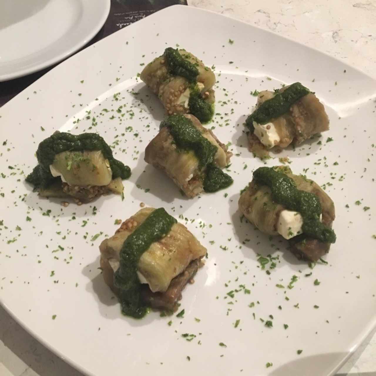 envuelto de berenjena queso y pesto