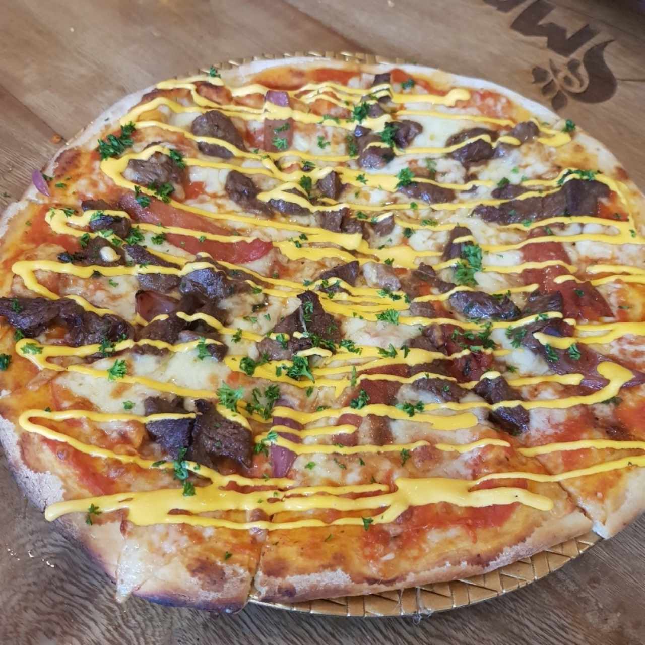 pizza de lomo salteado