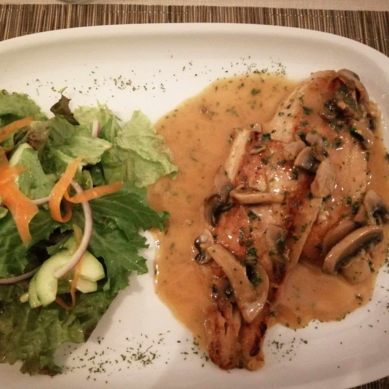 Corvina en salsa de cognac