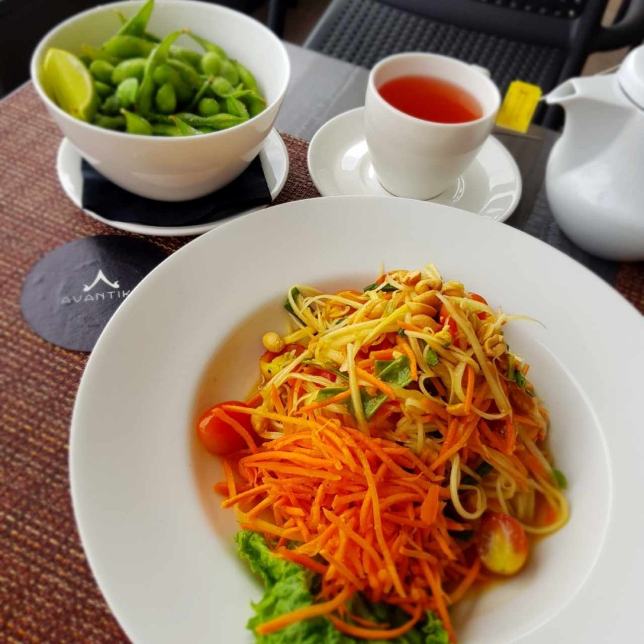 Green papaya salad and edamame