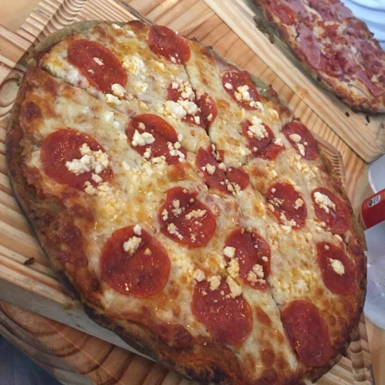 pepperoni with honey and feta. basil crust