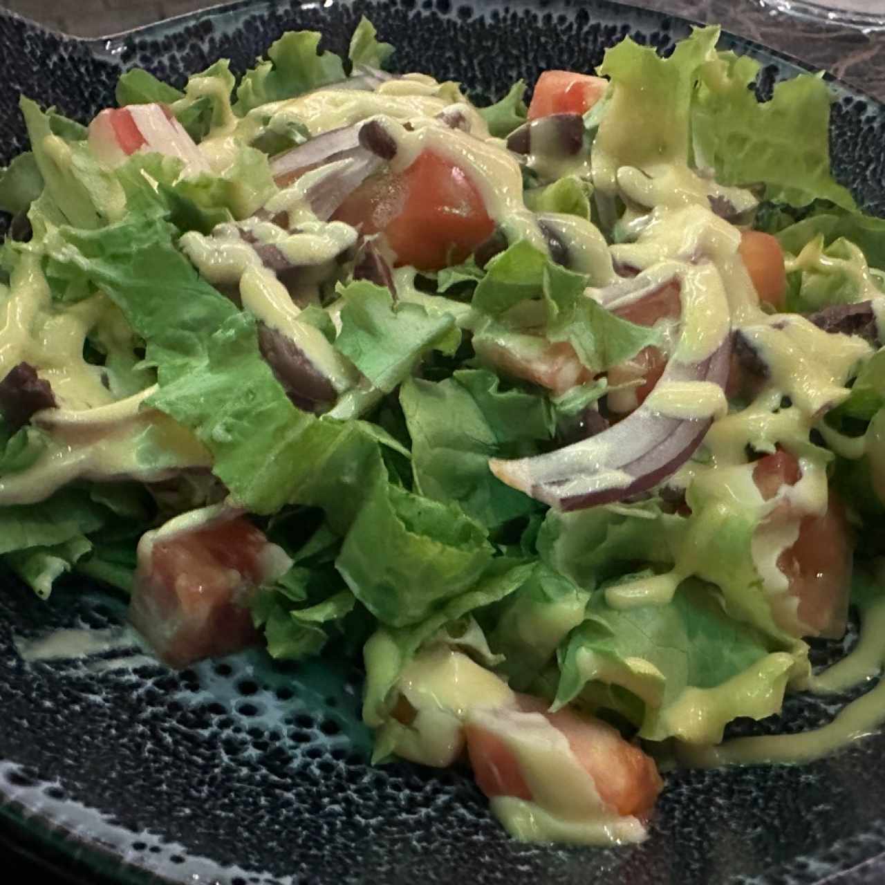 ensalada aconpañante del plato de picaña