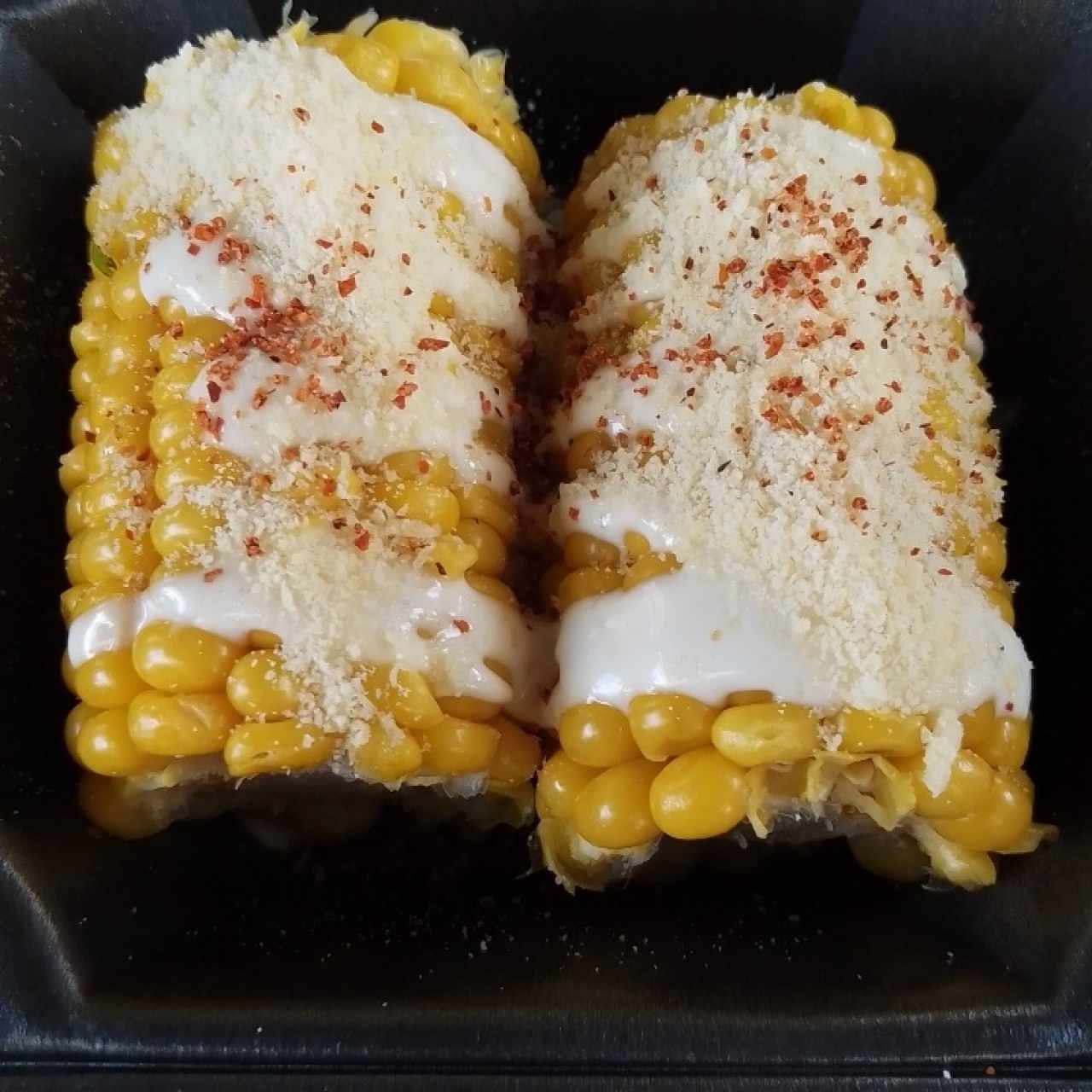 elote con queso y Tajín