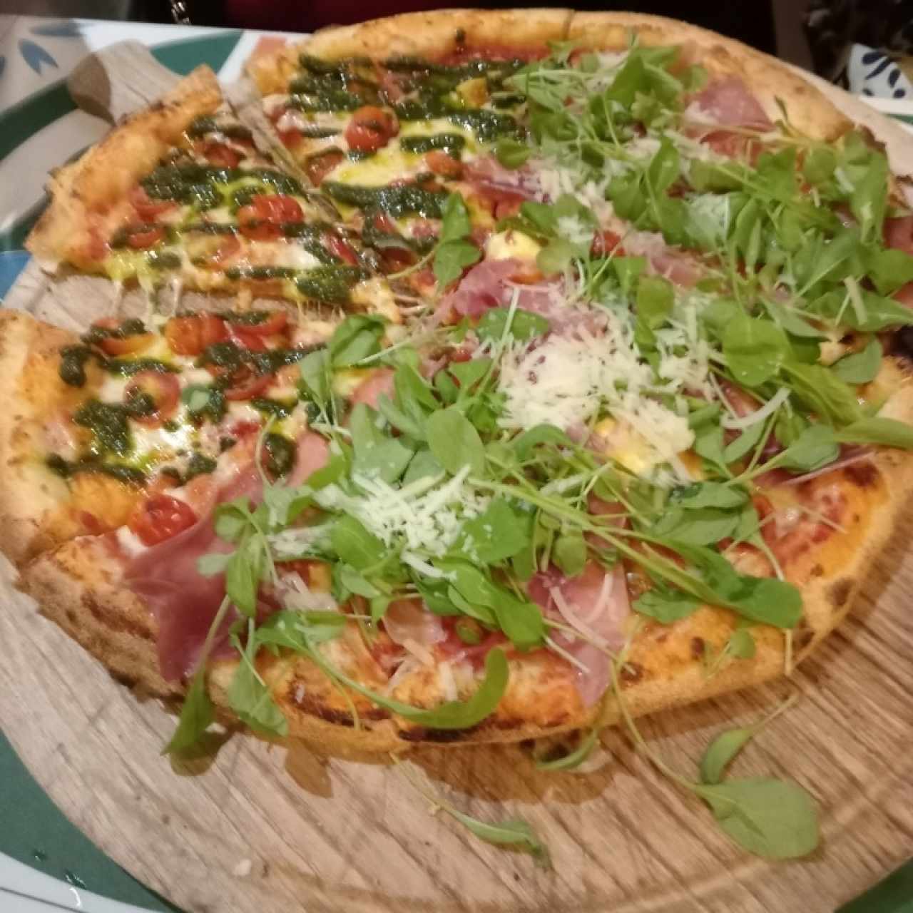 Pizza con esto y arugula