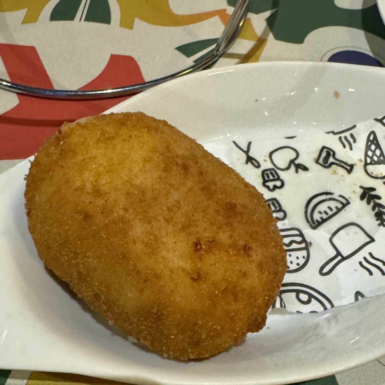 Arancino (Croquetas de arroz frito rellena)