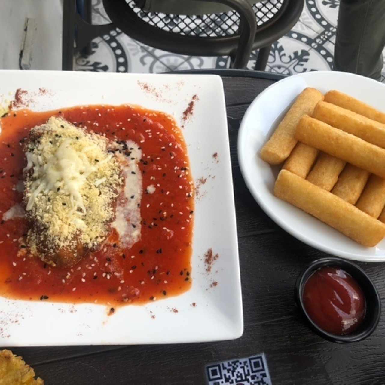 Milanesa de pollo a la parmigiana