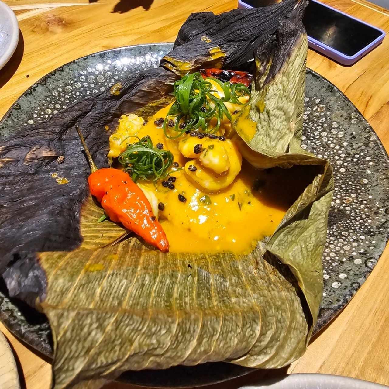 Tamal de arroz con langostino