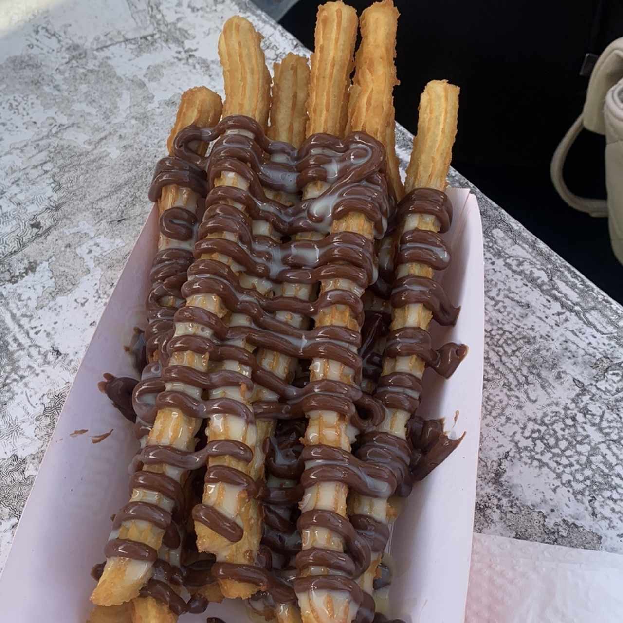 Churros glaseados chocolate y leche condensada