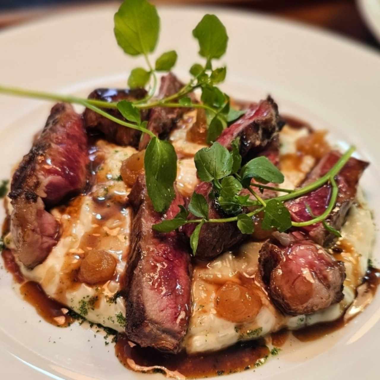 arroz meloso con queso de cabra y rib eye halal 