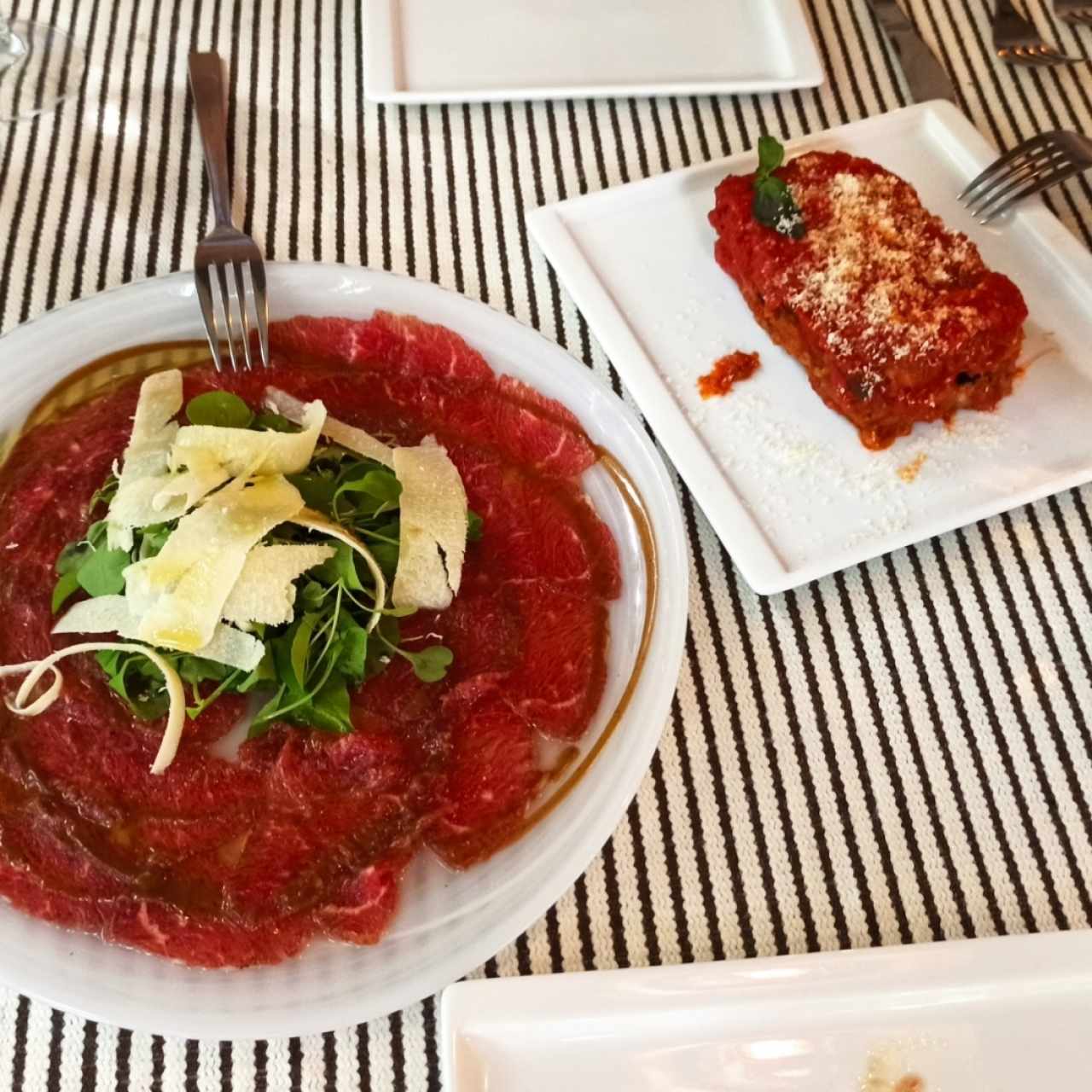 carpaccio de manzo y parmigiana 