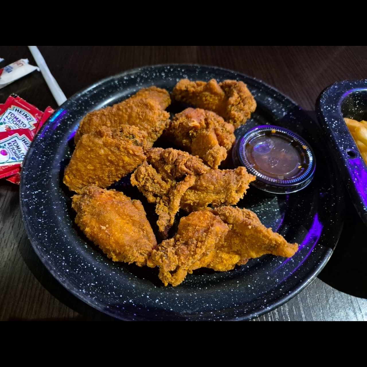 Fosters Wings con Papas