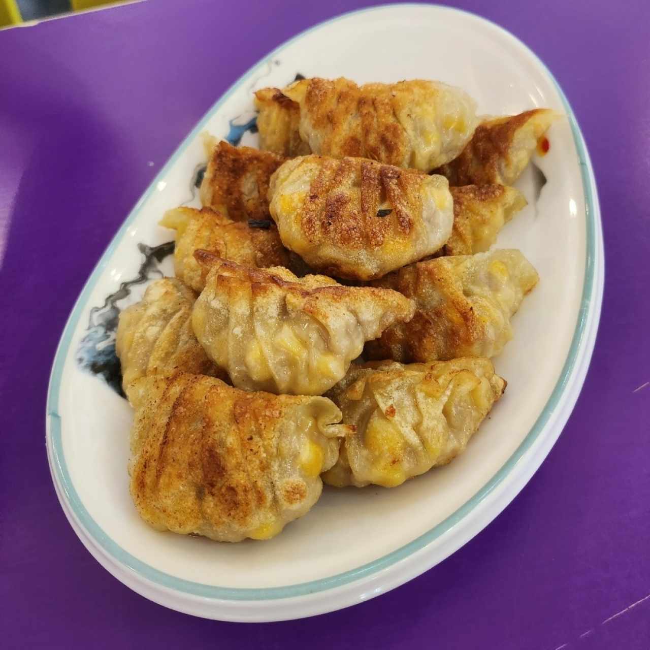 Dumplings de puerco con maíz 