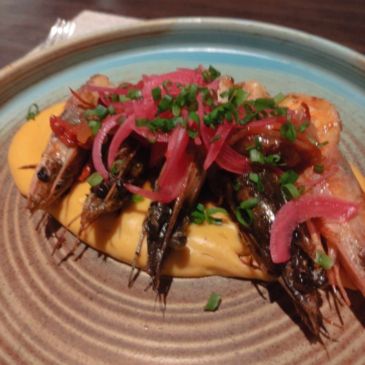 Langostinos en tamal de olla 