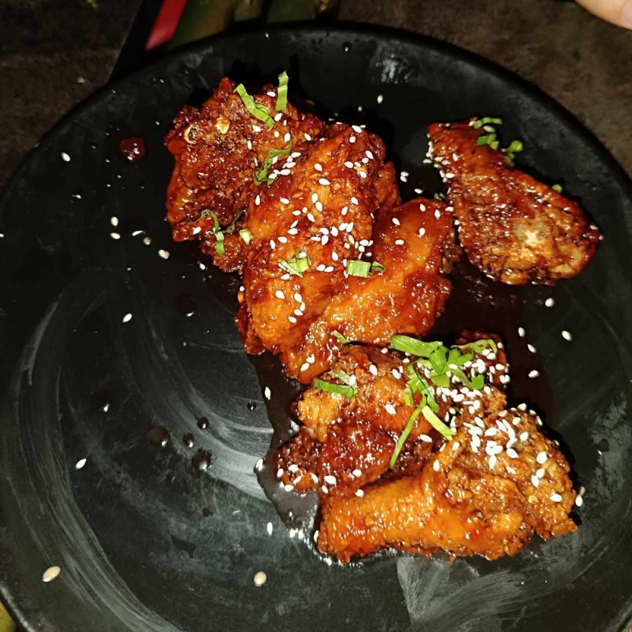 Alitas Bañadas en jalea de saril con ají chombo (8 und)