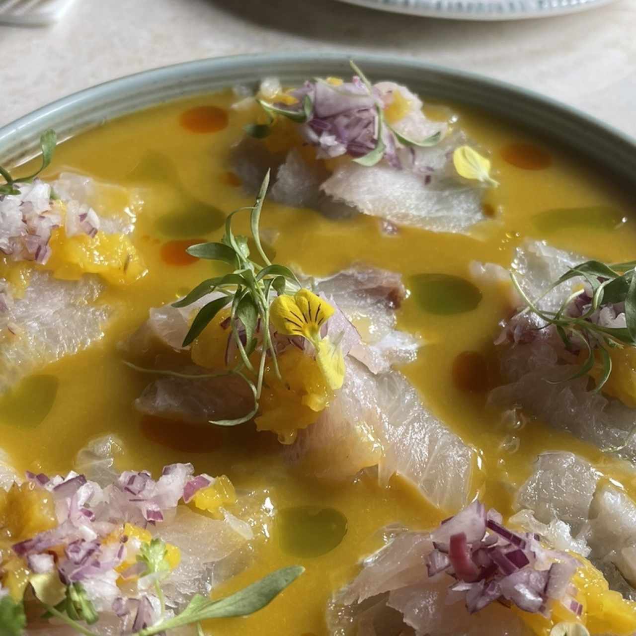 Tiradito de Kampachi y Mango