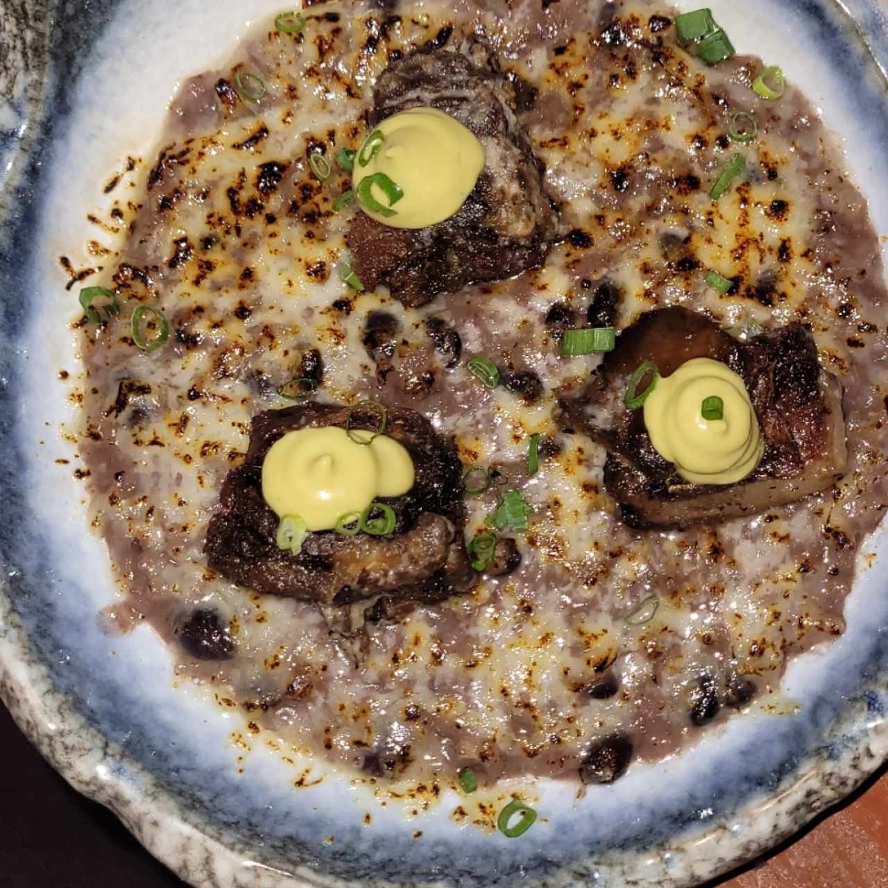 risotto de Black beans con costilla de cerdo