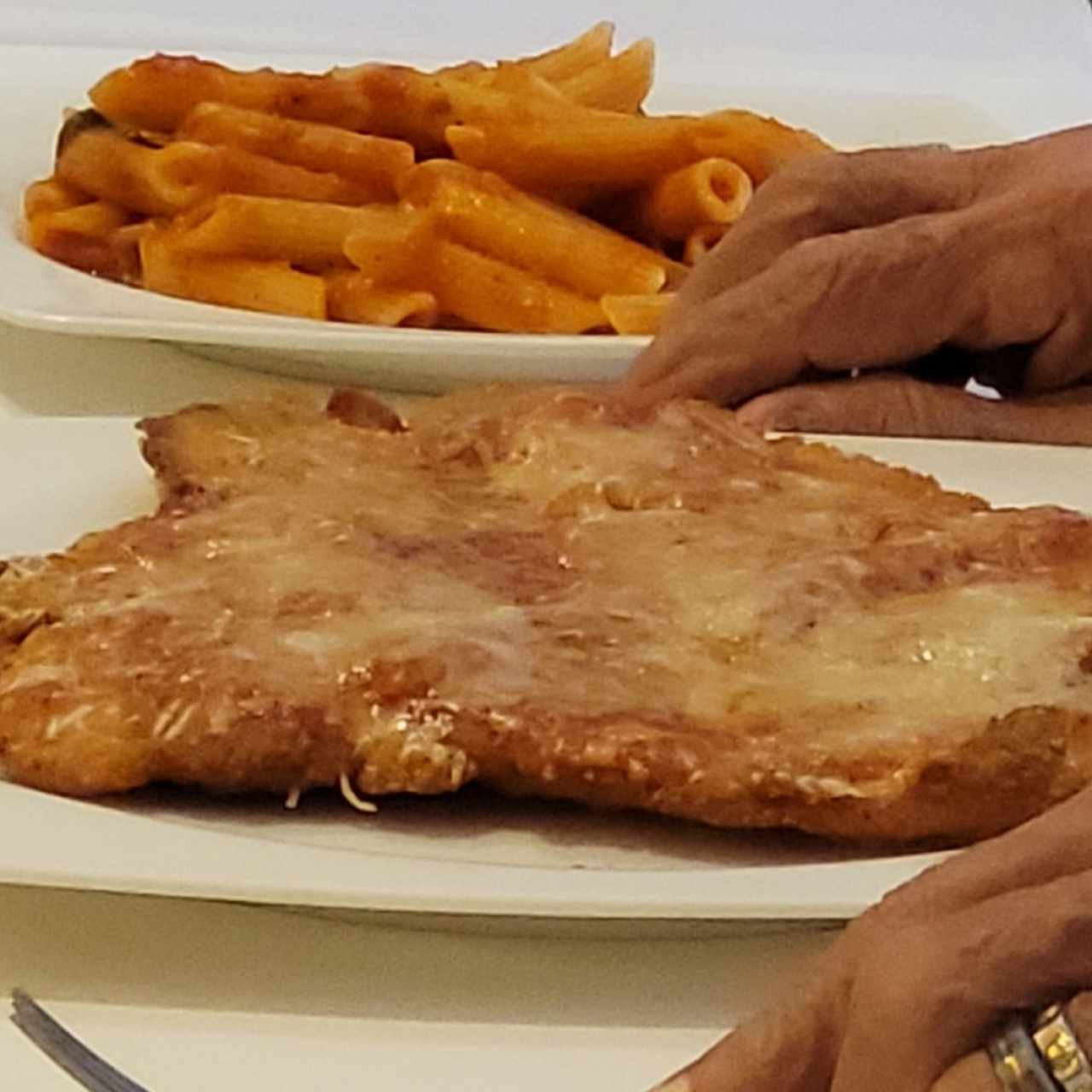 Milanesa de Res alla Parmigiana