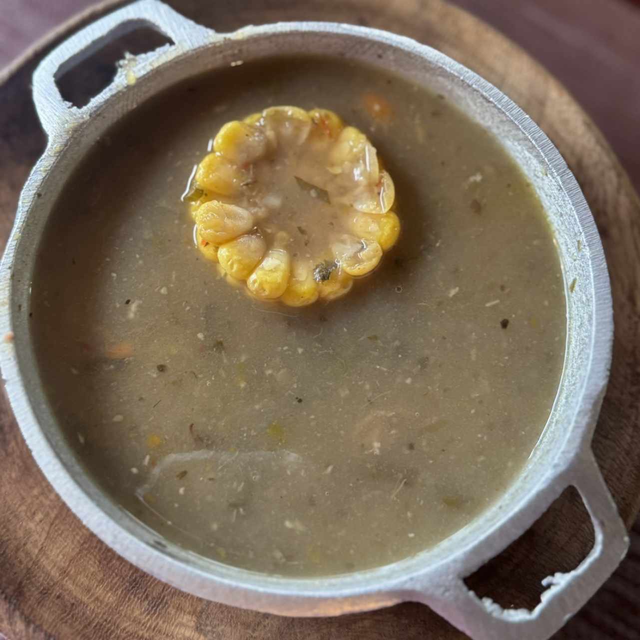 Sopa a la leña de nance con carne de res ahumada