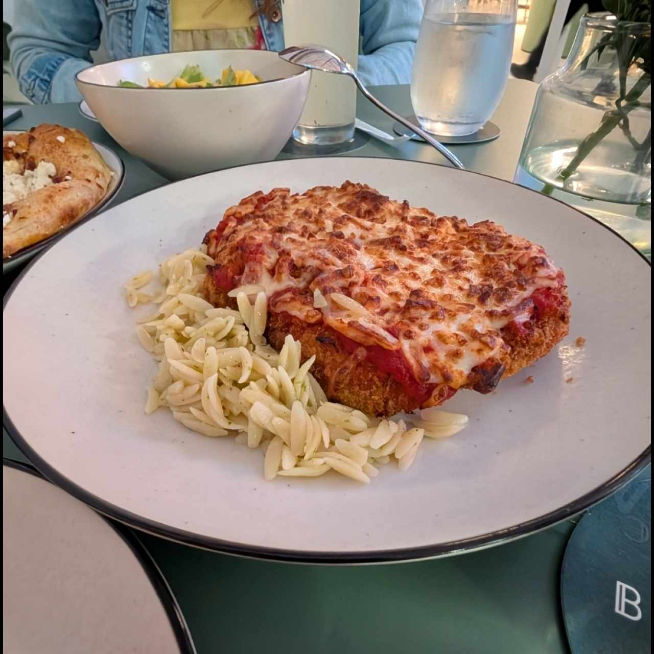Milanesa de pollo a la parmigiana