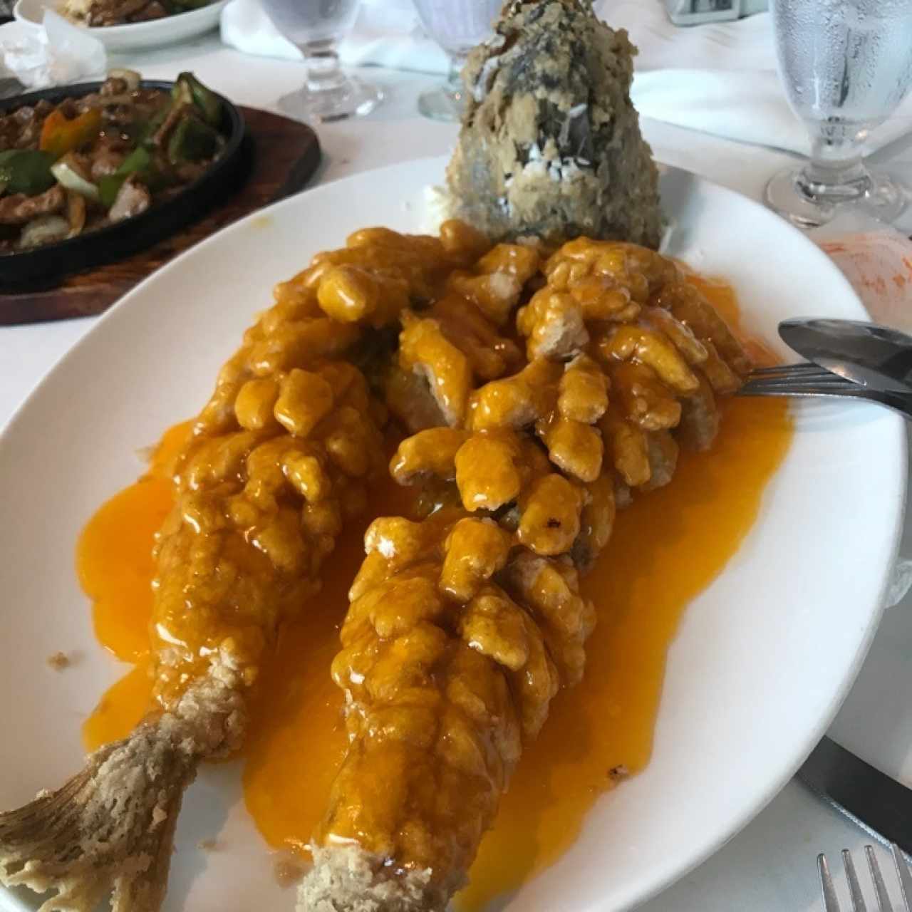 pescado racimo de uva en salsa de naranja 