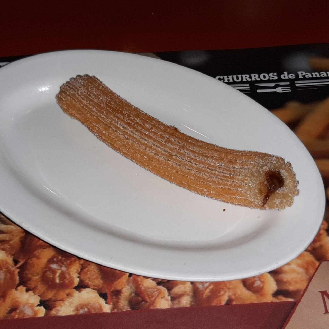 churro relleno con manjar