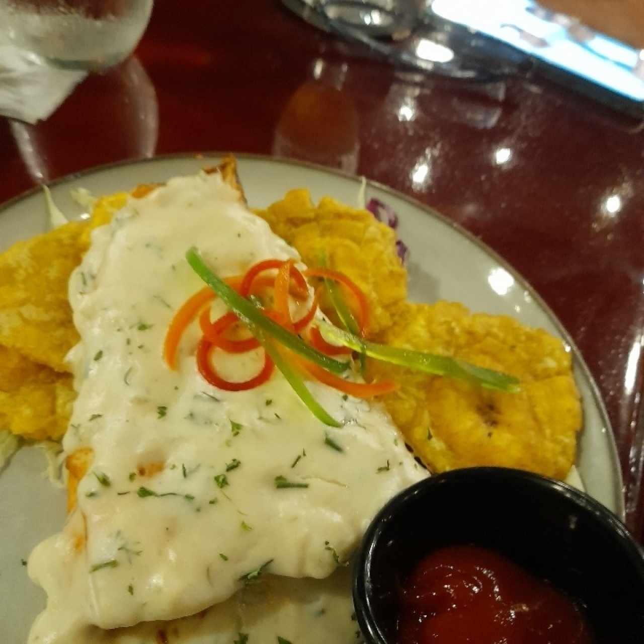 Salmon Fillet in Citrus Sauce with Fried Plantain Chips