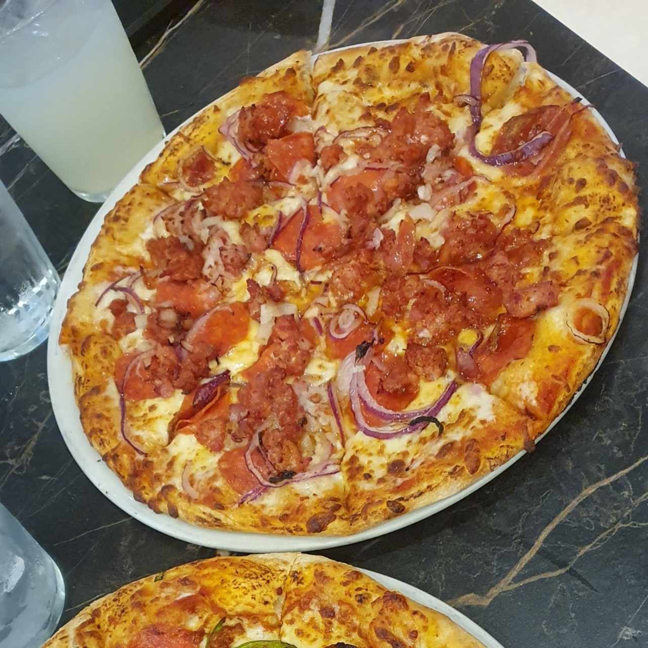 pizza tumba muerto