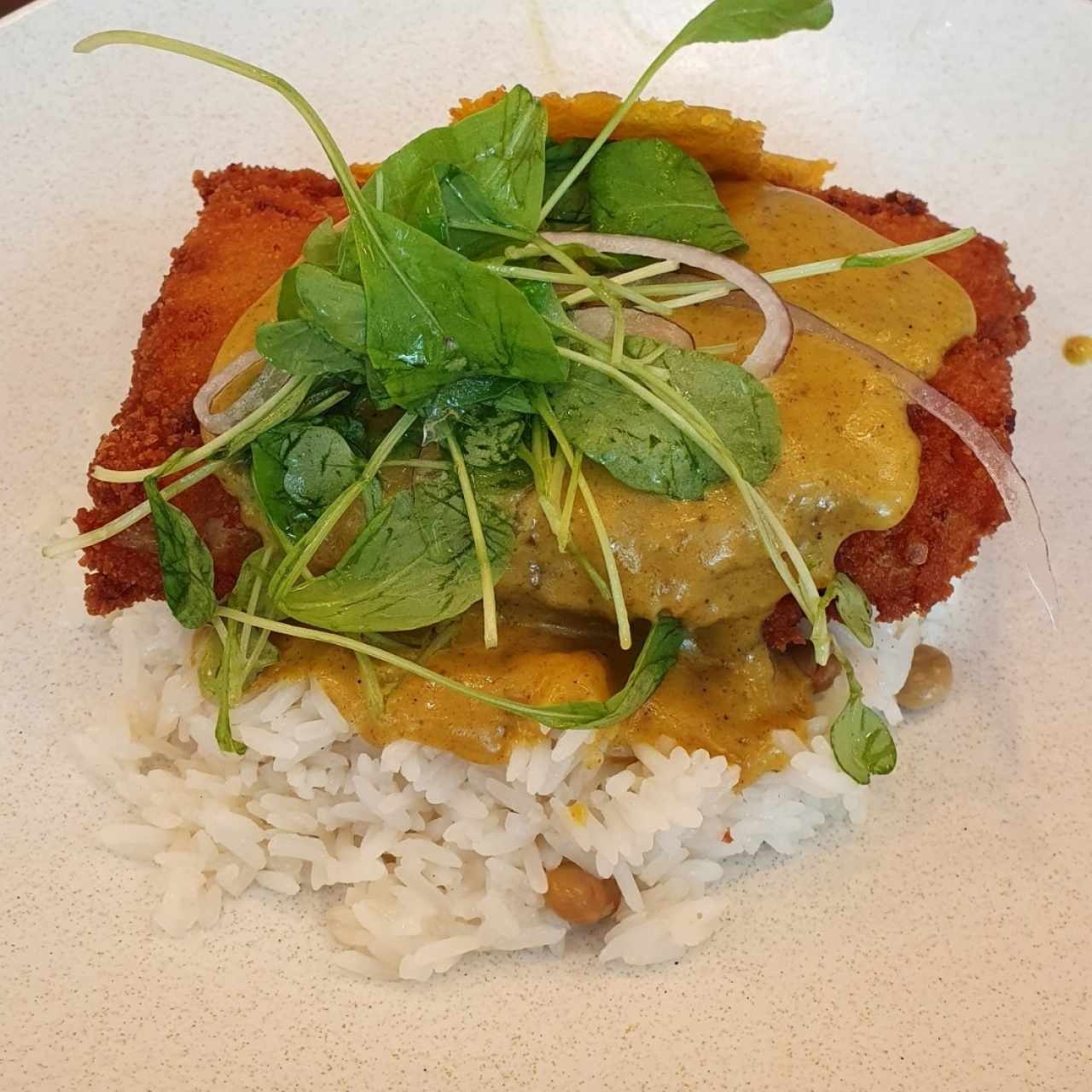 Corvina al Coco con Curry y arroz con guandú