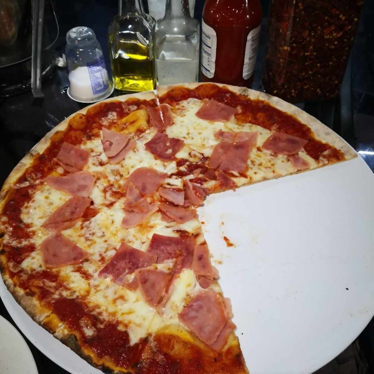 Pizza de jamón y queso