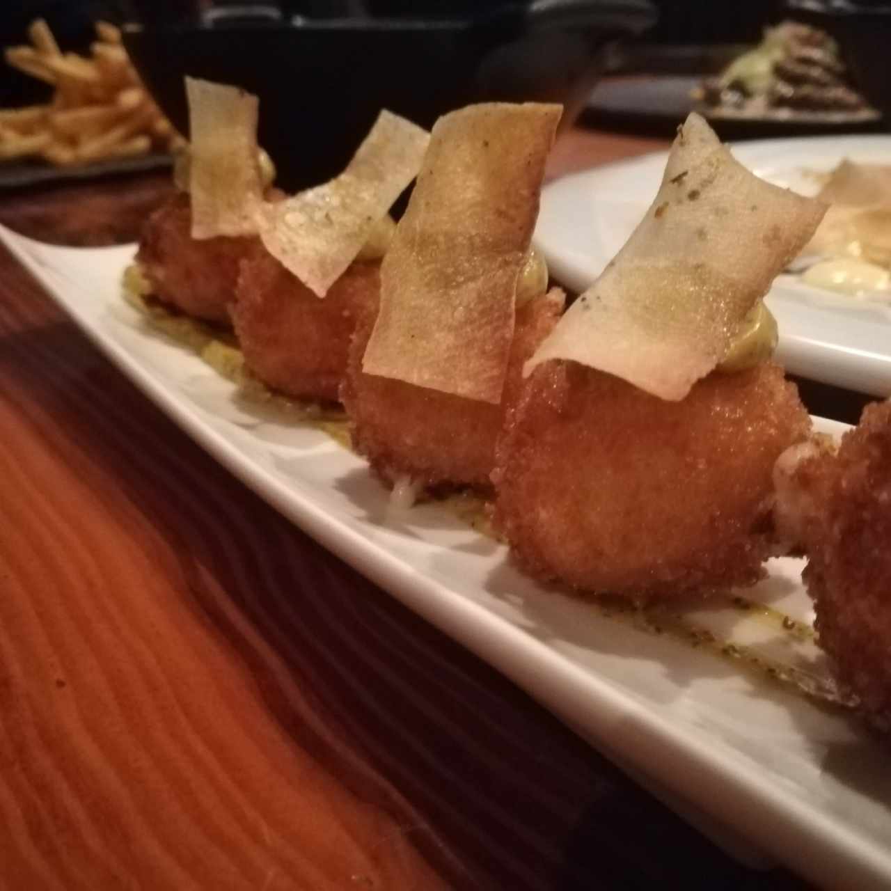 croquetas de janon serrano, mayonesa de achiote y culantro