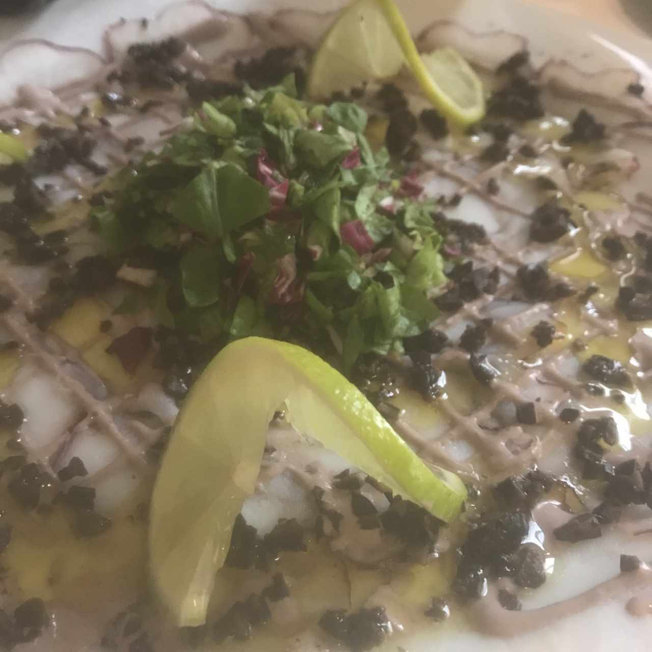 Carpaccio di polpo alla crema di olive