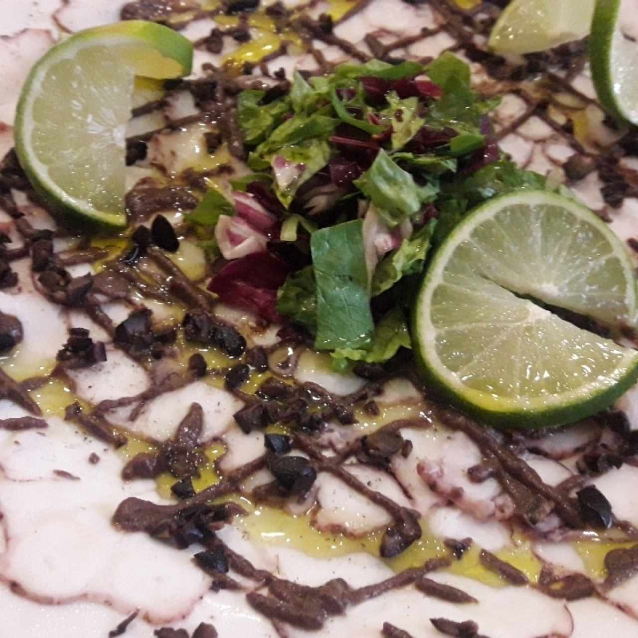 Carpaccio di polpo alla crema di olive