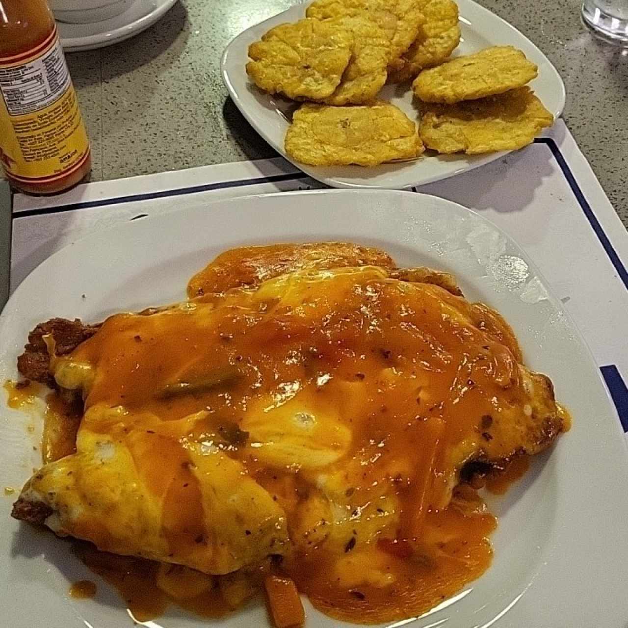 Filete de Corvina a la Parmesana