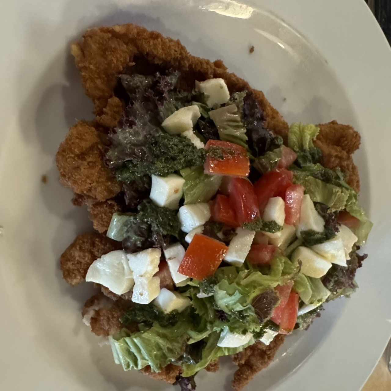 Milanesa con tomate cherry 