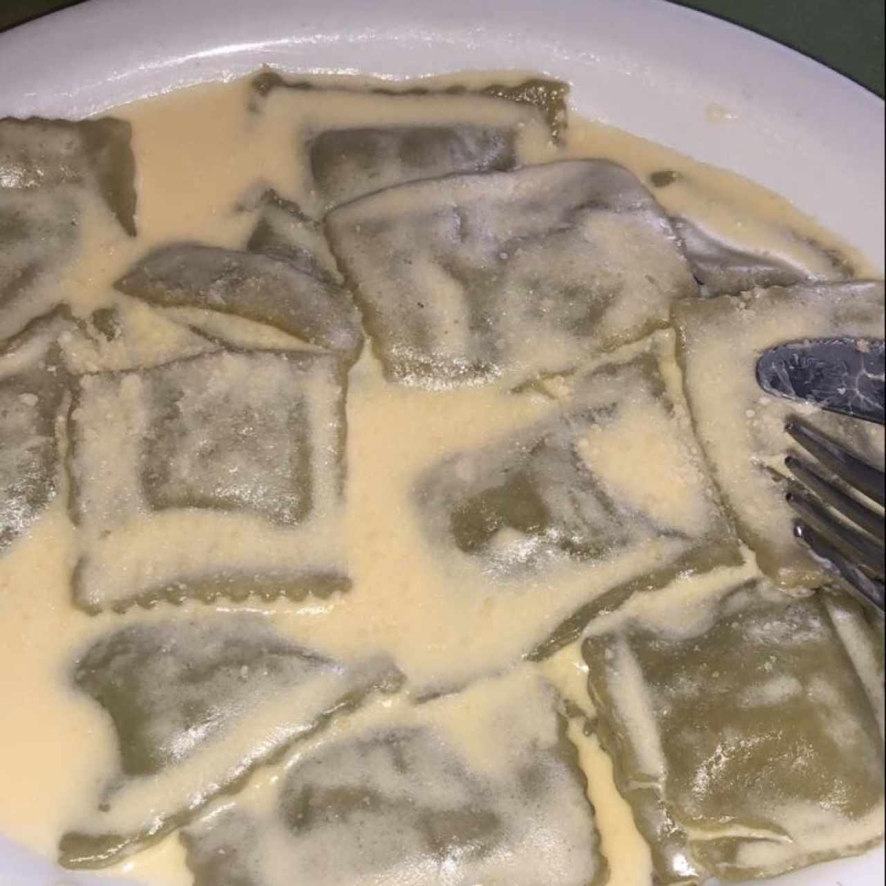 raviolis de ricotta en salsa blanca