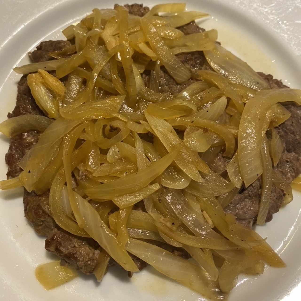 Bistec encebollado