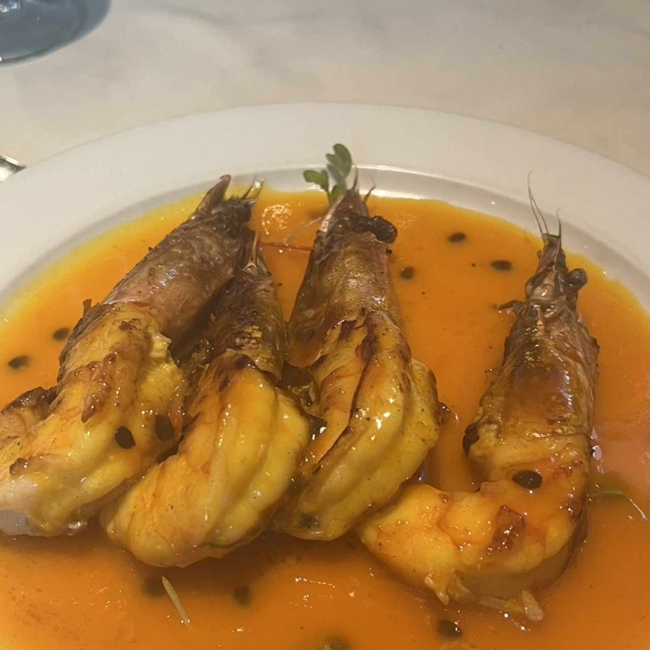 Langostinos al Ajillo o en Salsa de Maracuyá