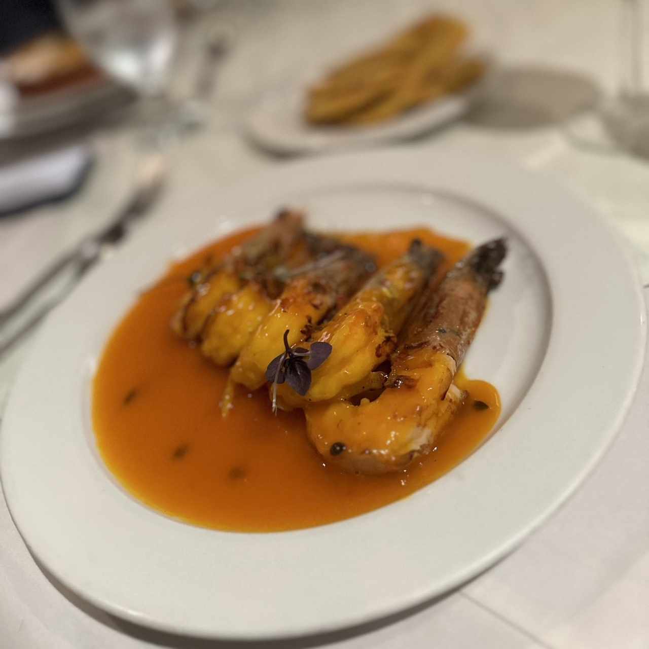 Langostinos al Ajillo o en Salsa de Maracuyá