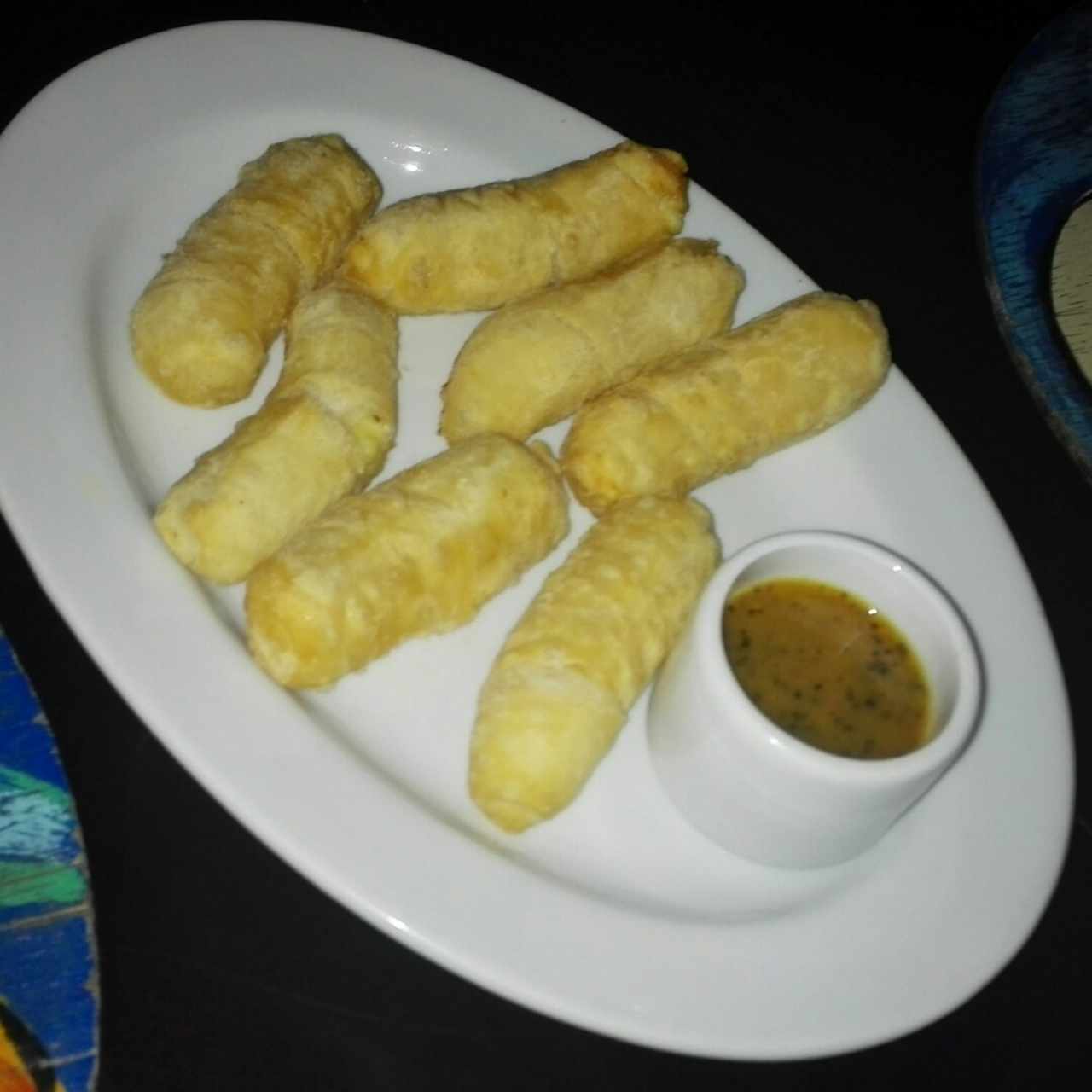 tequeños en salsa de parchita