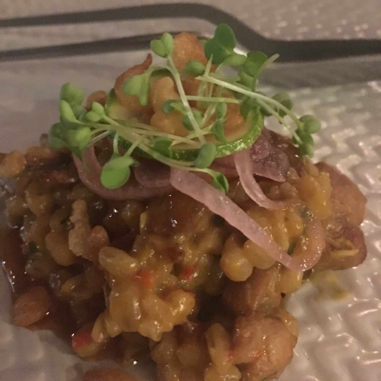 risotto de sebada con cerdo y reduccion de citricos 